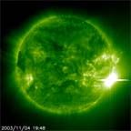 SOHO image of Sun artifically colored green