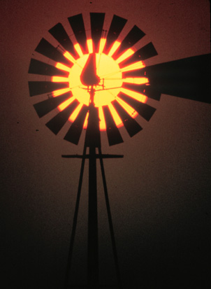 a windmill sunset